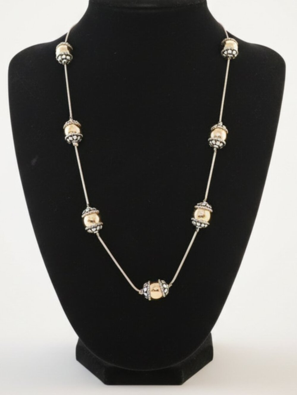 Silver-toned necklace accented by golden and silver spherical beads. Brand new. - Picture 3 of 3
